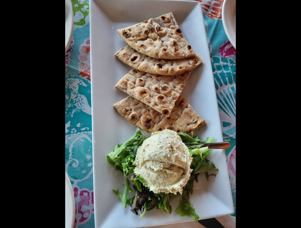 This Jersey Shore Restaurant Just Topped My List Of Best Places - fish dip is smoked Amberjack & Kingfish made into a creamy spread and served with Pita bread triangles on a bed of greens